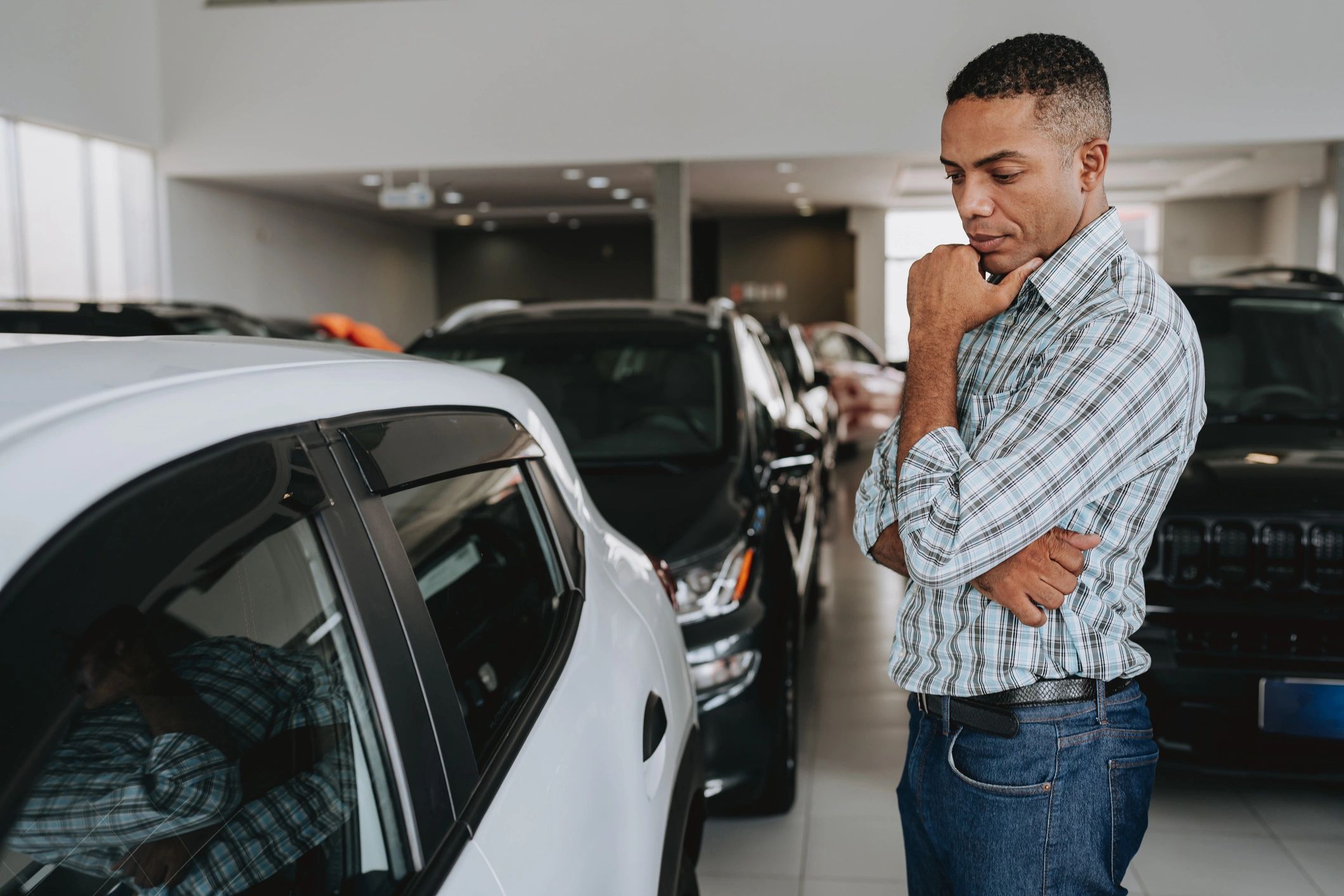 Car buyer reviewing vehicle options