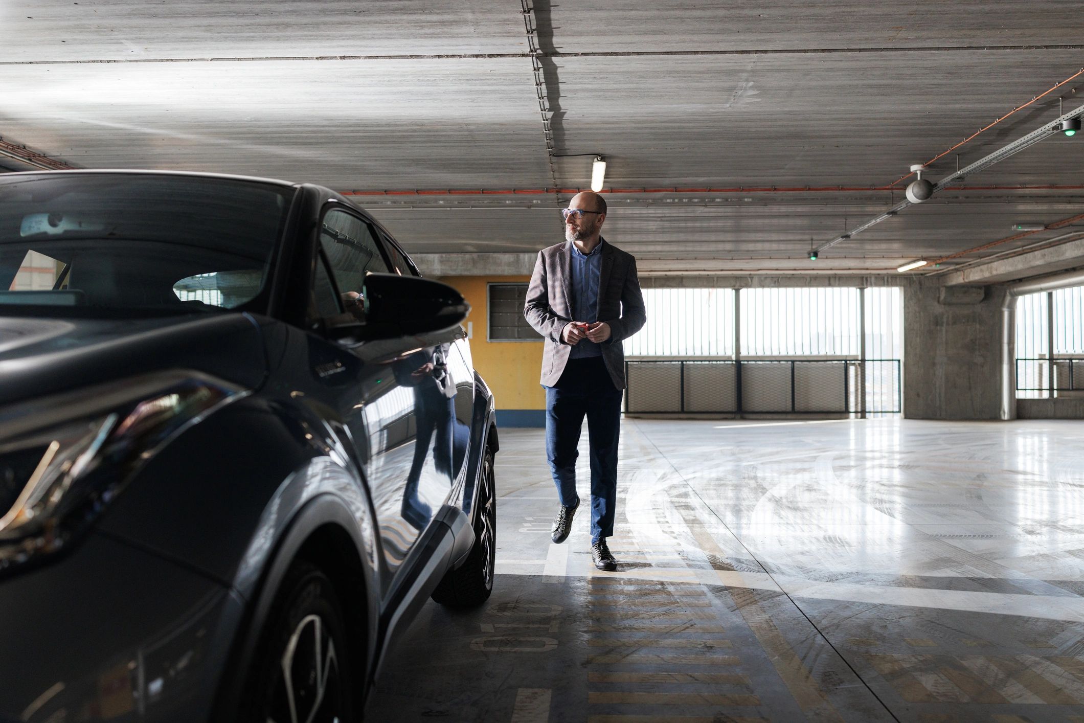 Driver preparing to use a vehicle while planning a car purchase budget